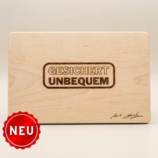 Uwe Steimles "GESICHERT UNBEQUEM" Frühstücksbrettchen - mit Autogramm